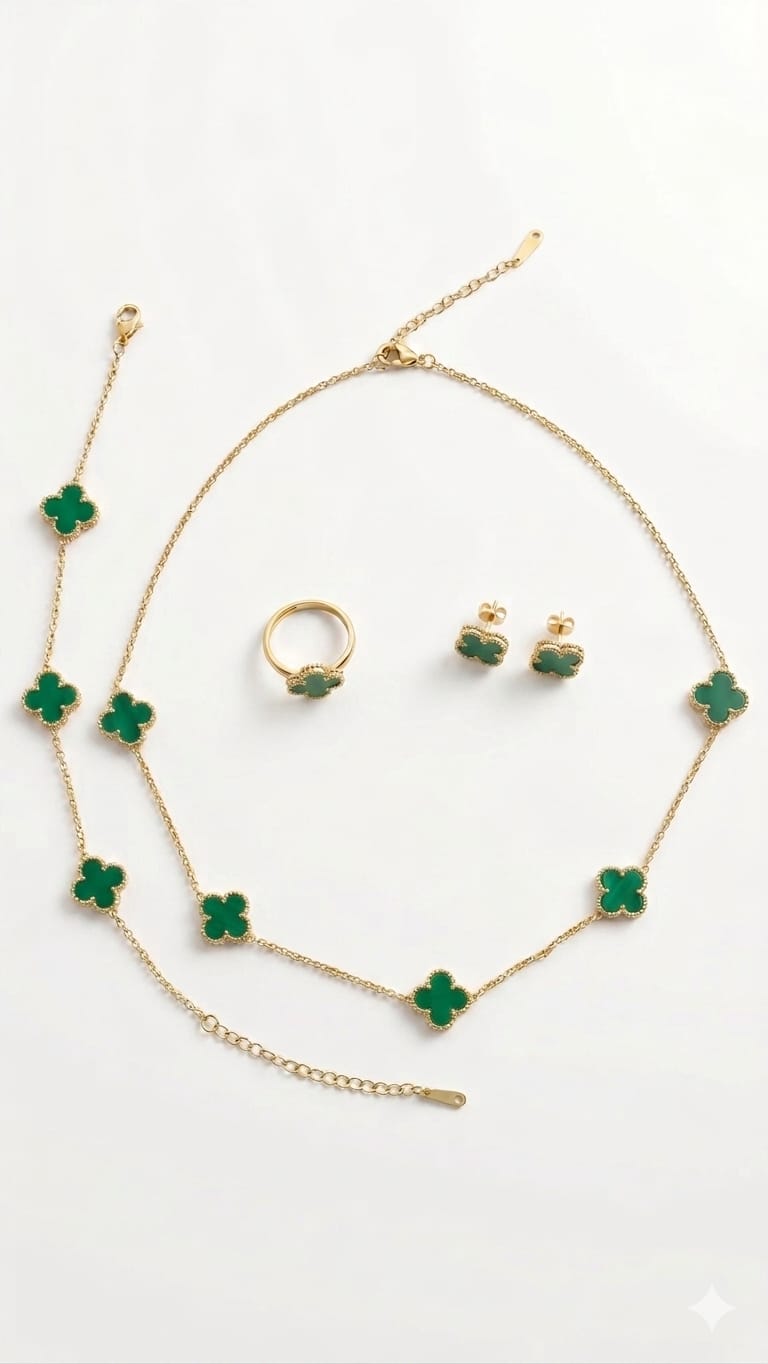 Prestige Accessories gold and malachite green clover complete jewelry set on white background.