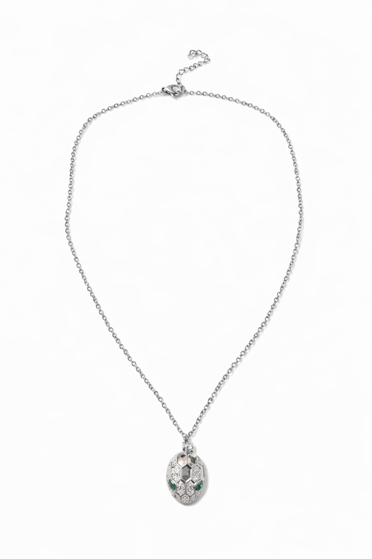 Serpent Gaze Medallion Necklace – Silver Pavé Snake Head with Emerald Accents