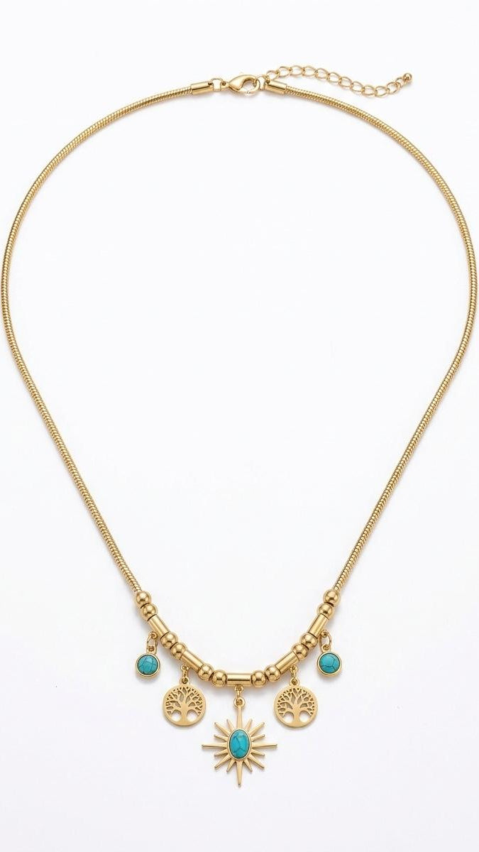 A gold-plated snake chain necklace featuring turquoise-set sunburst and Tree of Life charms on a white background.