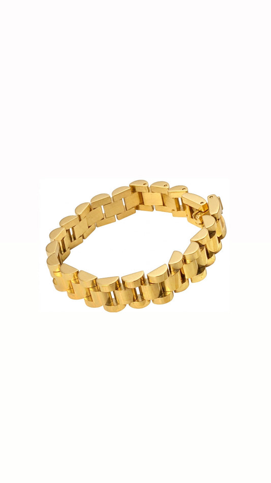 A heavy 18K gold-plated Presidential link bracelet with a high-polish finish and integrated clasp shown on a white background.