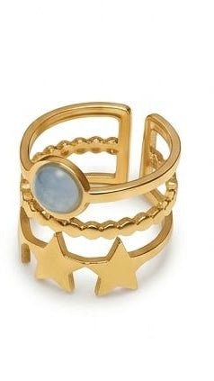 A triple-layered 18K gold-plated adjustable ring featuring a blue moonstone center, a beaded middle row, and two gold stars.