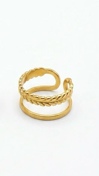 An adjustable 18K gold-plated double-band ring featuring one smooth band and one textured laurel leaf band on a white background.