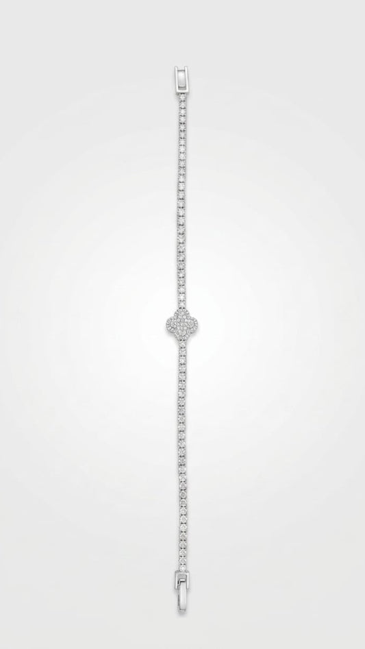 Overhead view of the Prestige full pavé tennis bracelet showing the secure clasp and clover detail.