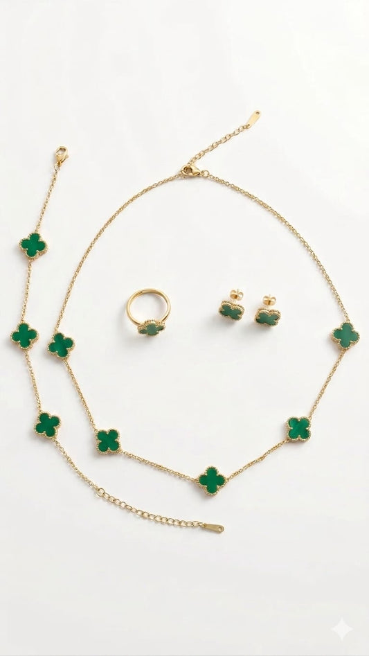 Prestige Accessories gold and malachite green clover complete jewelry set on white background.
